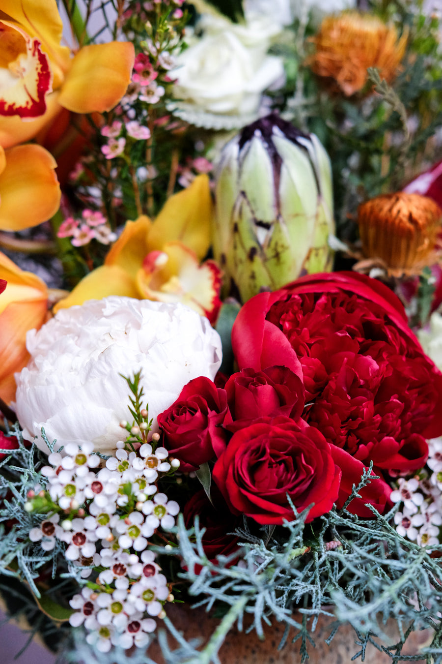 The Embrace of Revelry - Christmas Flowers